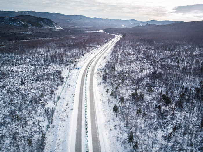 大气蜿蜒雪景北方公路雪景摄影图片
