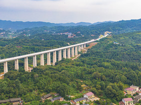 航拍新建穿大山越高铁轨道摄影图片