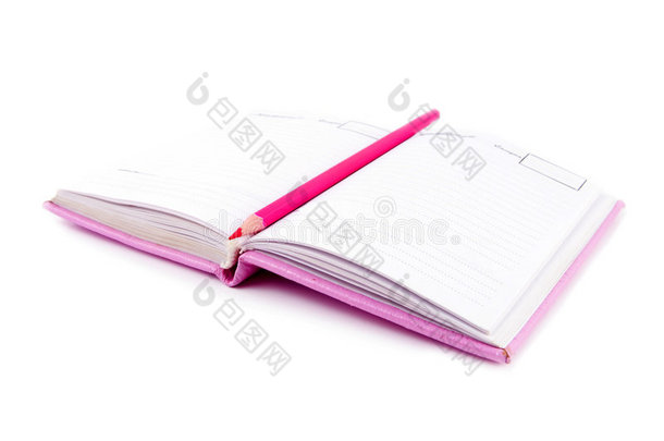 粉色笔记本和铅笔