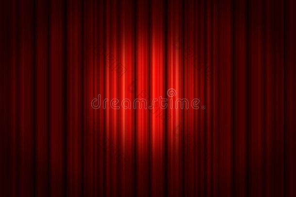 红色舞台窗帘上的聚光灯