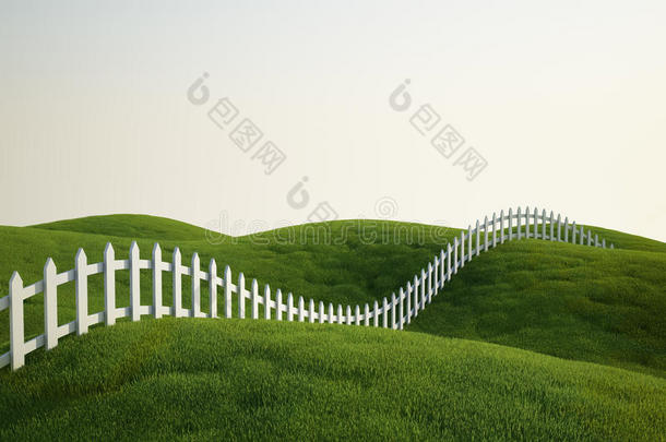 草地上的白色尖桩篱笆