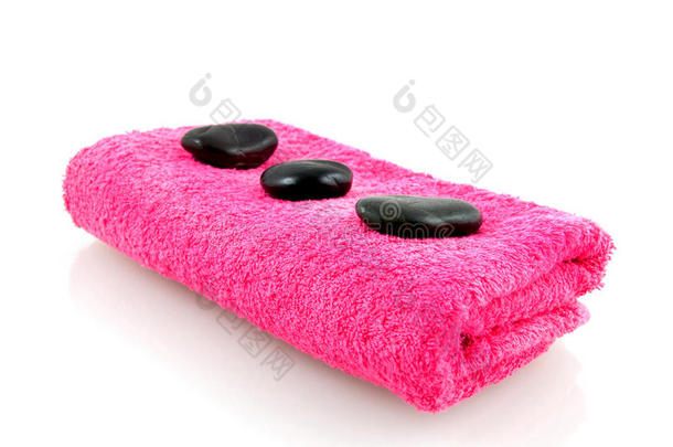 带按摩石的粉色毛巾