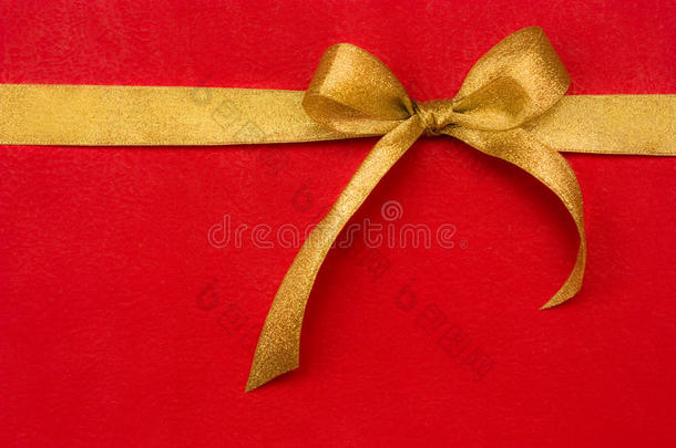 红色背景金色礼品丝带和蝴蝶结