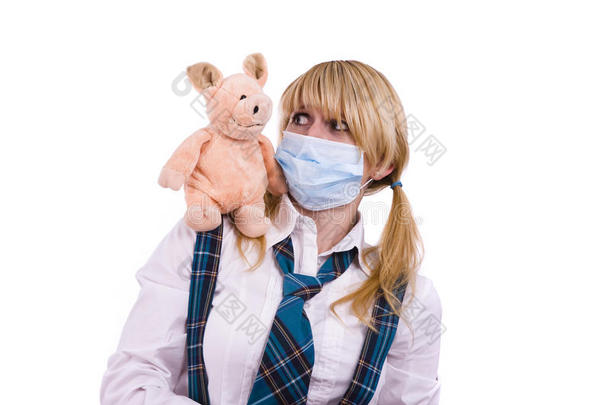 猪流感病毒。女学生带着面具的是害怕的猪