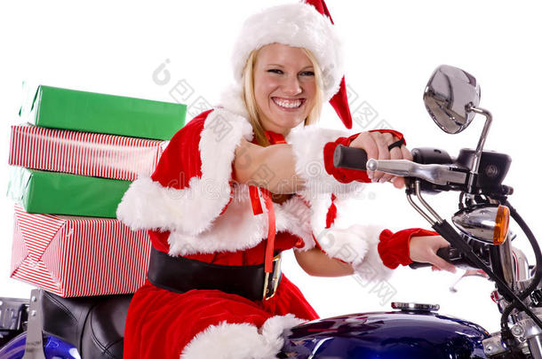 骑摩托车送礼物的圣诞老人助手