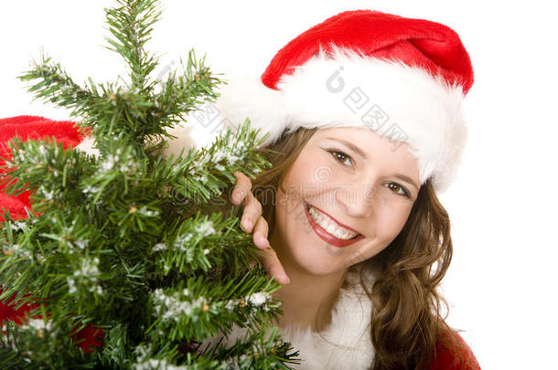 站在圣诞树旁微<strong>笑</strong>的圣诞女人