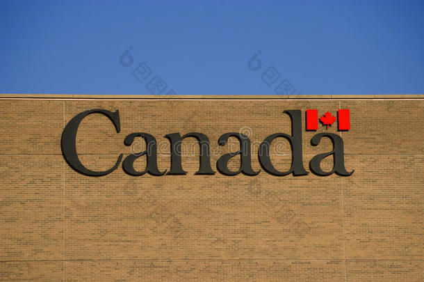 加拿<strong>大文</strong>字枫叶旗写在砖墙上