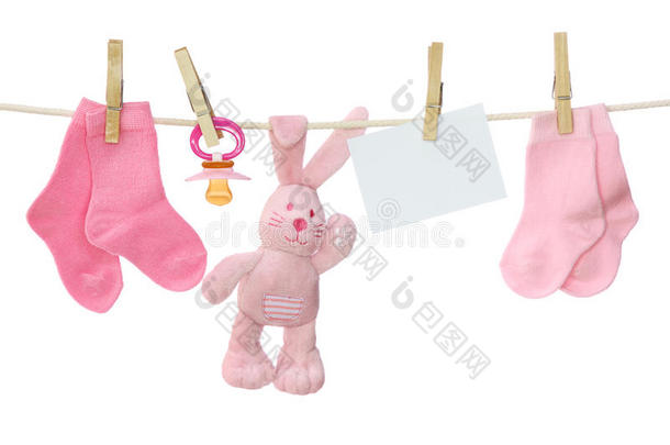 粉色婴儿用品和空白便条