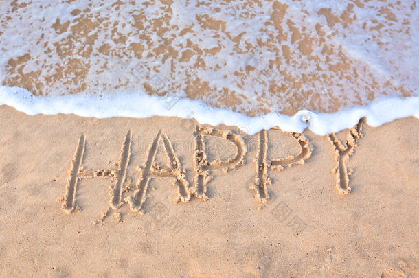 幸福字写在海岸边