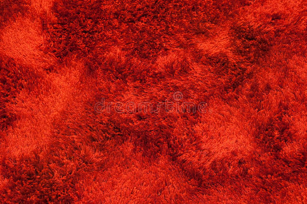 柔软蓬松的红色地毯背景纹理
