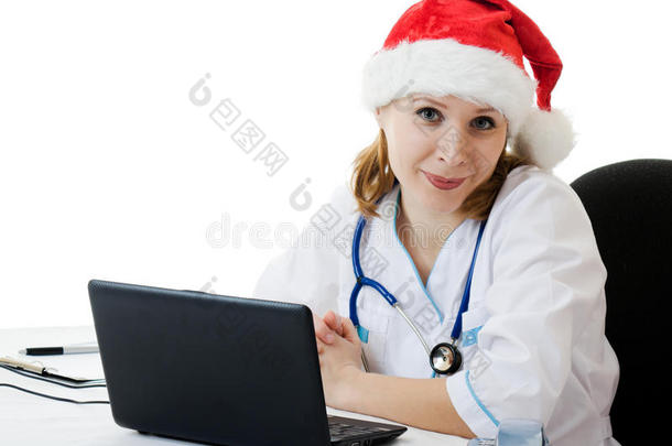 一位女医生在工作场所<strong>迎</strong>接<strong>圣诞</strong>节。