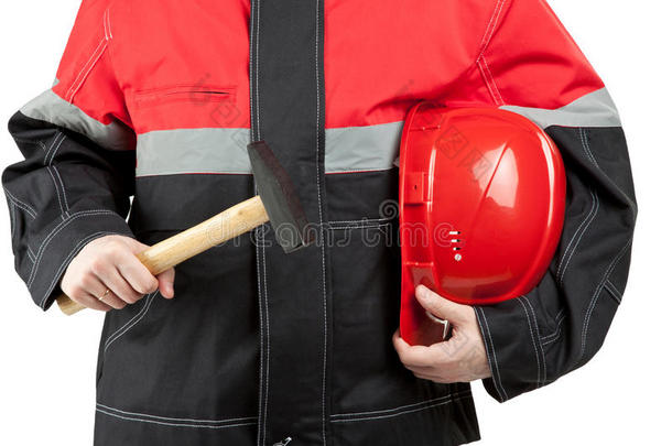 带锤子和安全帽的建筑工人
