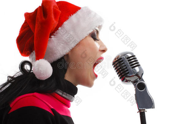 带麦克风的圣诞歌手