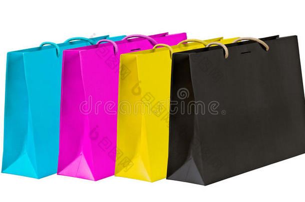 青色，洋红，黄色和黑色的购物袋。