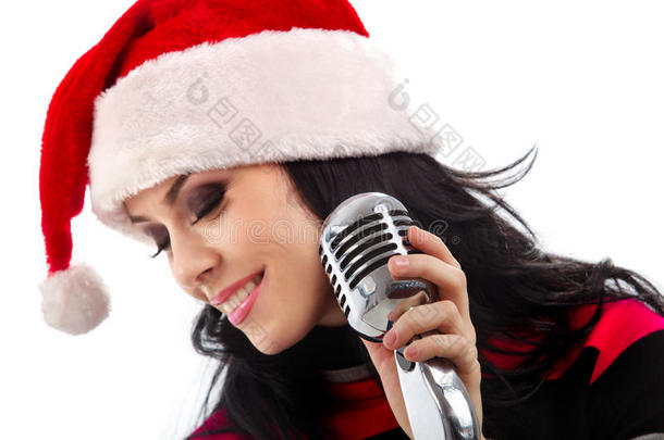 带麦克风的圣诞歌手