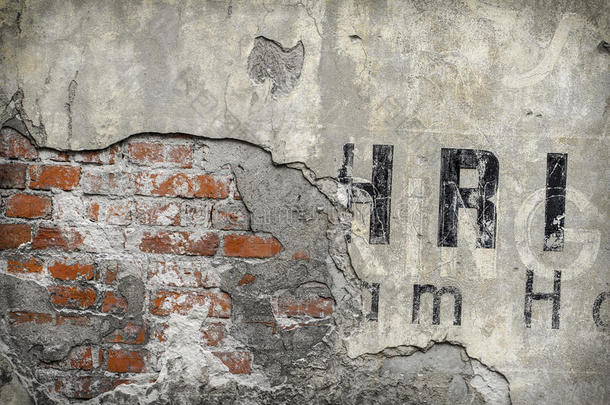 旧砖墙图案用字母碎片特写