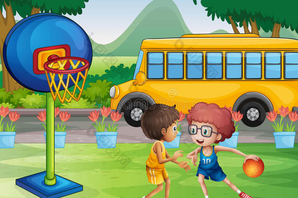 两个男孩在校车附近打篮球