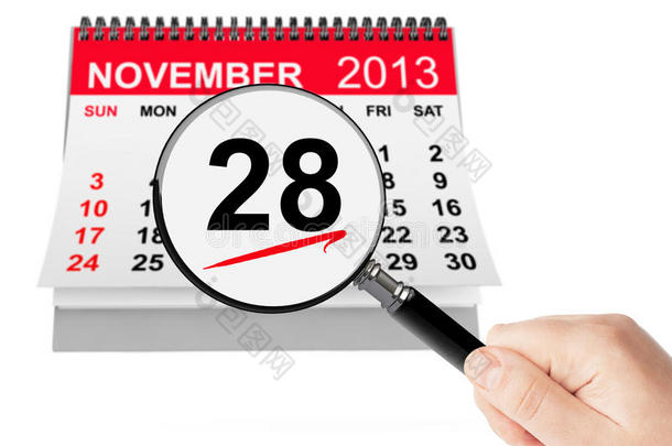 感恩节的概念。2013年11月28日带放大镜的日历