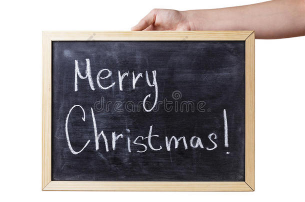 女青少年手持写有圣诞快乐短信的黑板