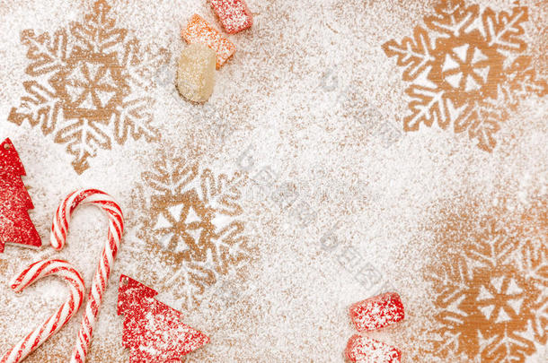 圣诞糖果，雪片和树的甜美背景