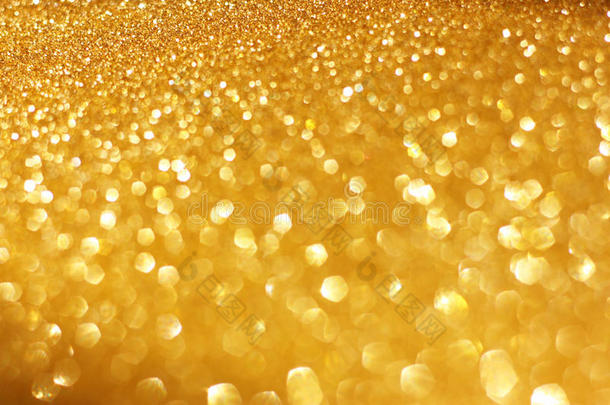 金色的<strong>春夏</strong>背景。优雅的抽象背景，带有波克散焦灯
