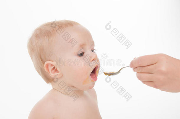 小可爱宝宝吃婴儿食品特写。