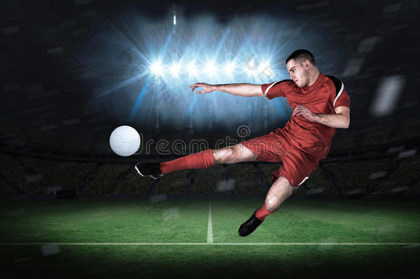 健康足球运动员踢球踢球的合成图像