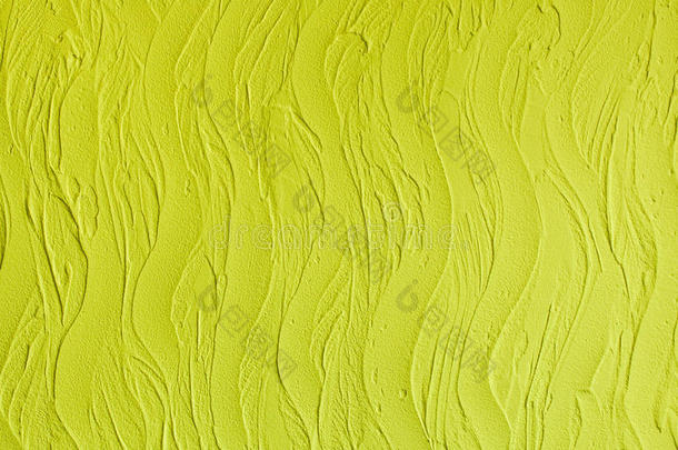 装饰石膏。 墙壁灰泥纹理。 在风格波，柠檬黄色的颜色。