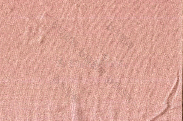 柔和的粉红色织物纹理作为背景