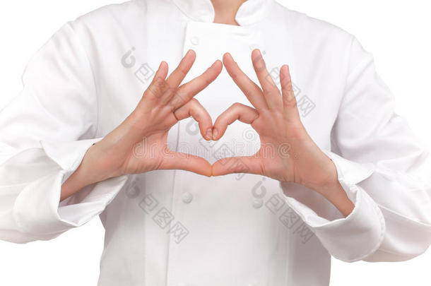 库克用双手做一个代表心脏的手势