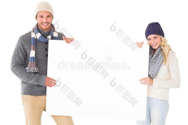 有<strong>吸引</strong>力的夫妇在冬季时尚展示<strong>海报</strong>