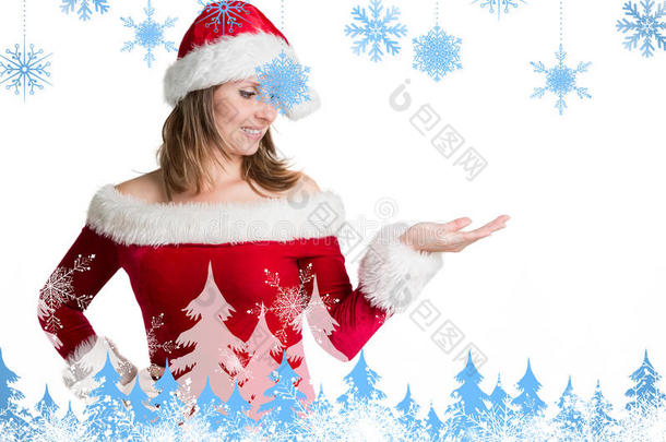 穿着圣诞老人服装的美女展示您的产品的合成图像