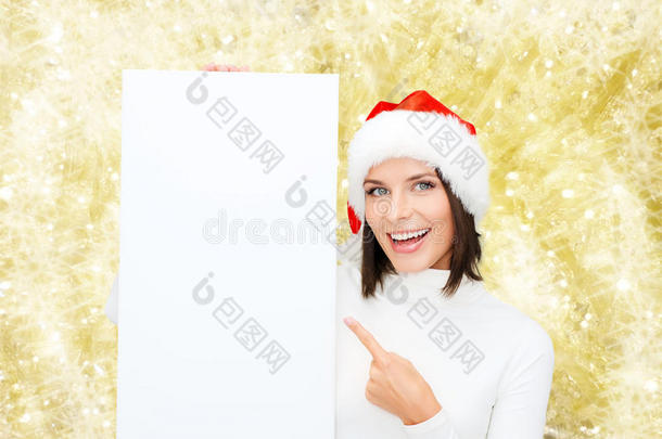 戴着圣诞帽、白板的微笑的年轻女子