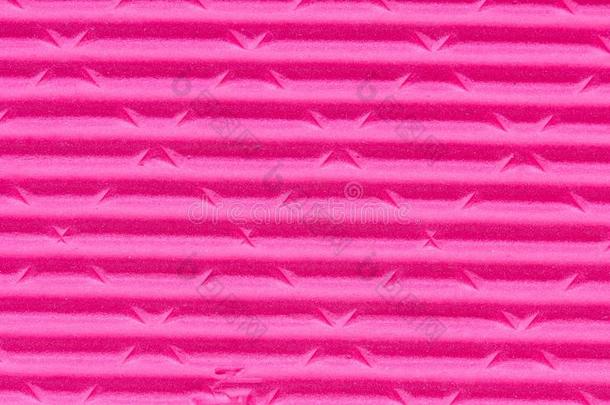 一只粉红色拖鞋的旧而脏的鞋底的纹理，背景