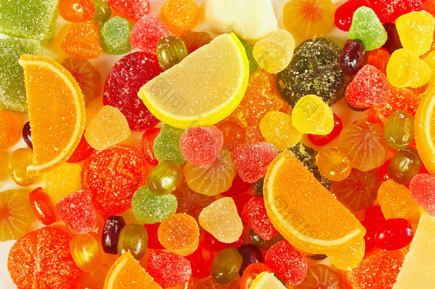 彩色水果糖果和果冻特写的背景
