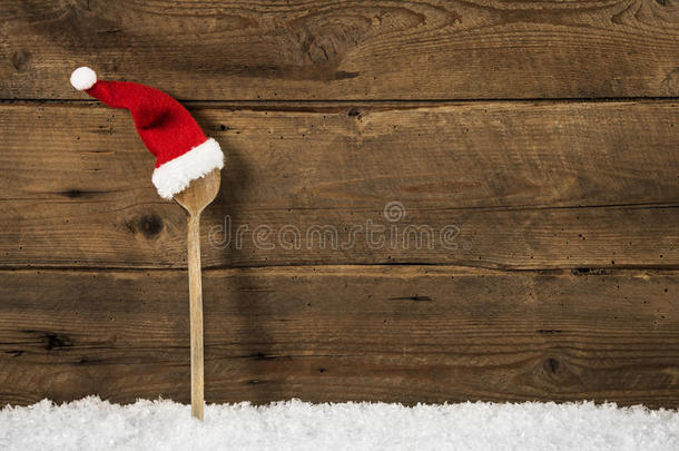 圣诞帽木勺：乡村圣诞背景