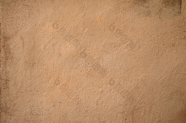 旧墙用黄色灰泥覆盖的质感