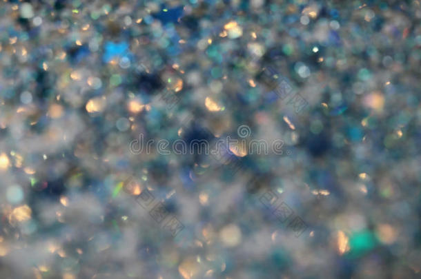 蓝色和银色的冰雪冬天闪闪发光的星星背景。节日、圣诞节、新年抽象质感