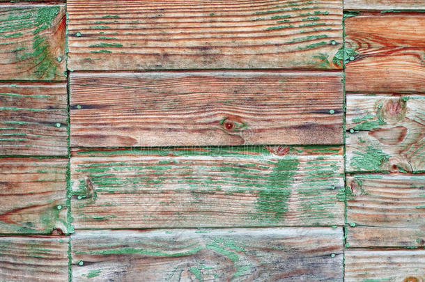 绿色油漆脱落的木板<strong>墙面纹理</strong>