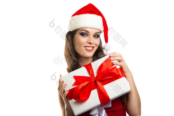 漂亮的年轻女孩，穿着圣诞服装送礼物