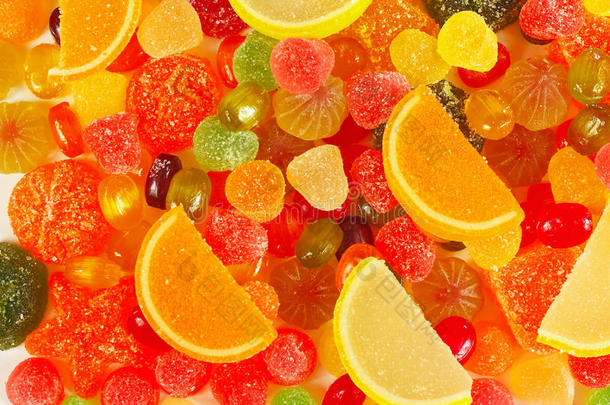彩色水果糖果和红枣特写的背景