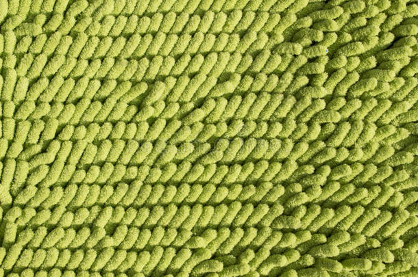 漂亮的背景绿地毯纤维。