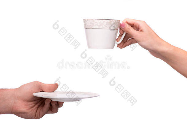 手给杯子和茶托