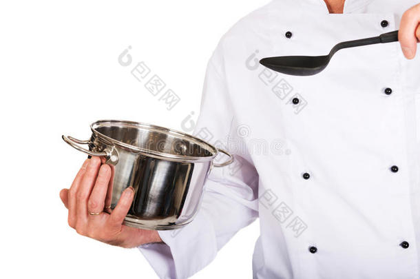 厨师的手拿着<strong>不锈钢</strong>锅和<strong>勺子</strong>