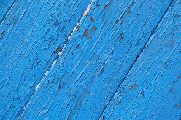 开裂的木制表面蓝色背景