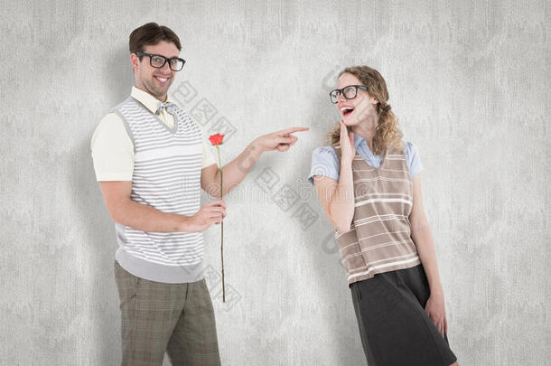 一张古怪的嬉皮士拿着玫瑰指着他的女朋友的综<strong>合照</strong>片