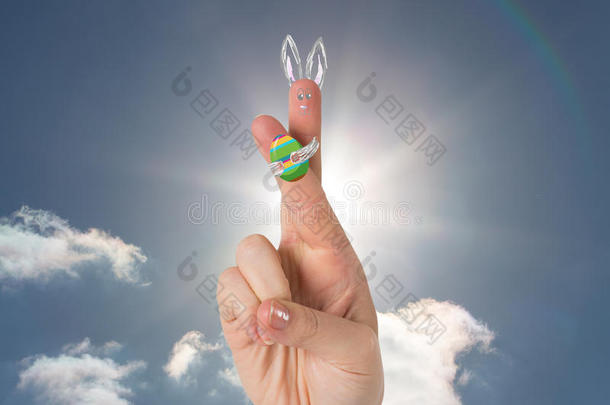 手指作为复活节兔子的复合图像
