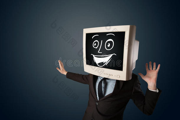 一个快乐的商人有一个电脑显示器头和一个笑脸