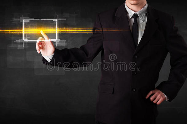 科技商务人士用橙色光束触摸按钮