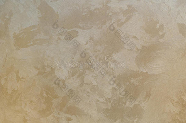 米色金色石膏墙的背景纹理